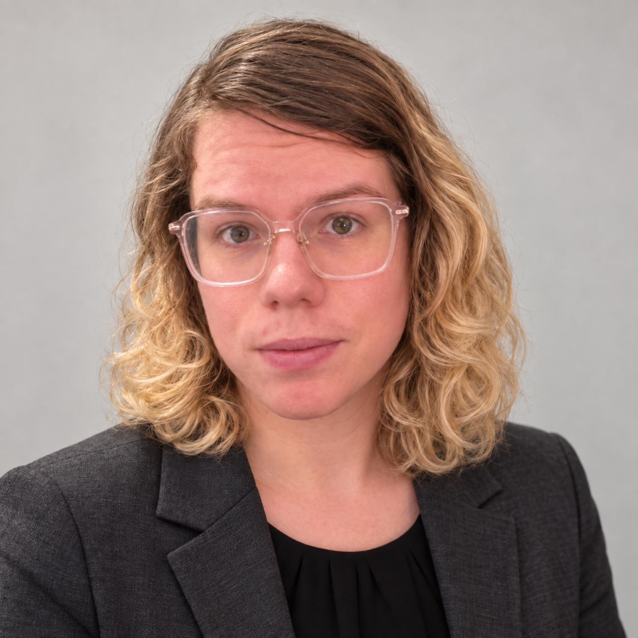 Professional headshot of Romy Mondello